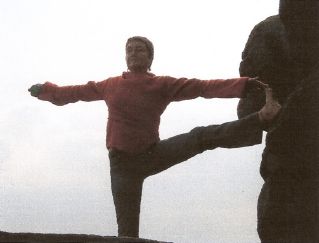 Padangusthasana on a rock
